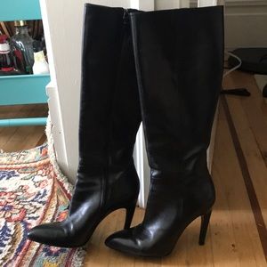 Knee high black leather boots